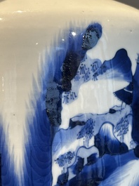 A Chinese blue and white rouleau vase with fishermen in a landscape, Kangxi