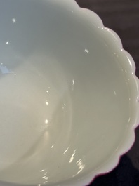 A pair of Chinese ruby-glazed bowls, Qianlong mark, 19/20th C.
