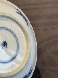 Two Chinese blue and white cups and three saucers with figural design, Kangxi and later