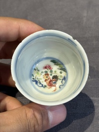 A pair of Chinese famille rose 'chicken' cups, Qianlong mark and of the period
