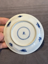 Two Chinese blue and white cups and three saucers with figural design, Kangxi and later