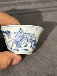 15 Chinese blue and white saucers and 13 cups with figural design, Kangxi/Yongzheng