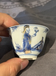 15 Chinese blue and white saucers and 13 cups with figural design, Kangxi/Yongzheng
