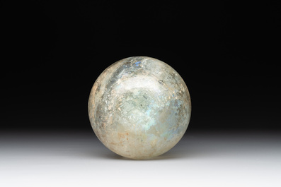 A Roman glass bottle with a conical neck, 4/5th C.