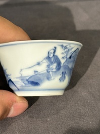 15 Chinese blue and white saucers and 13 cups with figural design, Kangxi/Yongzheng