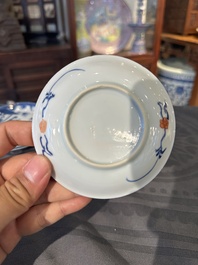 15 Chinese blue and white saucers and 13 cups with figural design, Kangxi/Yongzheng