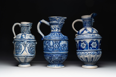 A varied collection of 8 Westerwald stoneware jugs, 19th C.
