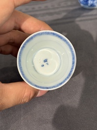 15 Chinese blue and white saucers and 13 cups with figural design, Kangxi/Yongzheng