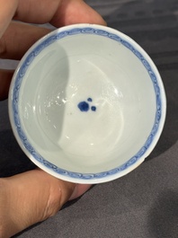15 Chinese blue and white saucers and 13 cups with figural design, Kangxi/Yongzheng