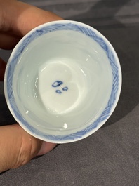 15 Chinese blue and white saucers and 13 cups with figural design, Kangxi/Yongzheng