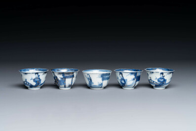 15 Chinese blue and white saucers and 13 cups with figural design, Kangxi/Yongzheng