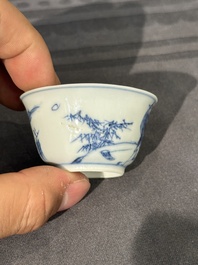 15 Chinese blue and white saucers and 13 cups with figural design, Kangxi/Yongzheng