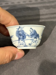 15 Chinese blue and white saucers and 13 cups with figural design, Kangxi/Yongzheng