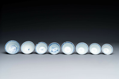 15 Chinese blue and white saucers and 13 cups with figural design, Kangxi/Yongzheng