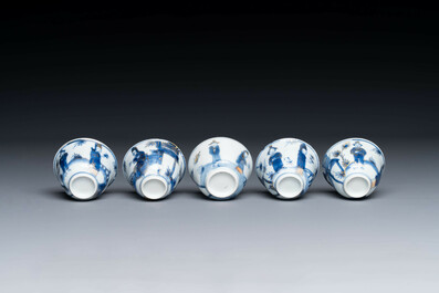 15 Chinese blue and white saucers and 13 cups with figural design, Kangxi/Yongzheng