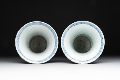 Two Chinese blue and white 'gu' vases with landscape and floral panels, Kangxi