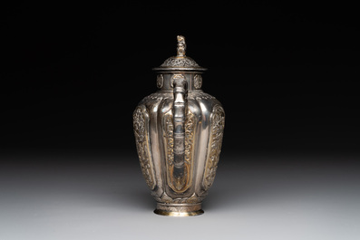 A Chinese parcel-gilt silver wine ewer for the Peranakan or Straits market,  Xuan Huang Hao 炫煌號 and An Yi Zao 安益造 mark, 19/20th C.