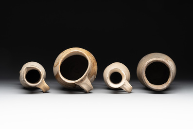 A collection of 8 German proto stoneware ribbed jugs, including 'Jacobakans', 14th C.