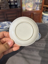 15 Chinese blue and white saucers and 13 cups with figural design, Kangxi/Yongzheng