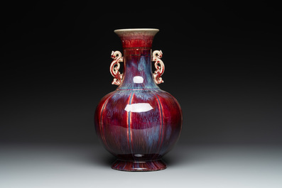 A Chinese flamb&eacute;-glazed vase with archaistic dragon handles, 19th C.