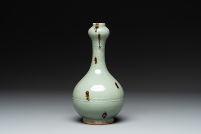A Chinese russet-splashed Longquan celadon garlic-mouth vase, Yuan/Ming