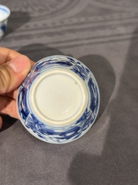 15 Chinese blue and white saucers and 13 cups with figural design, Kangxi/Yongzheng