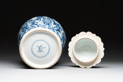 A Chinese blue and white vase and cover with landscapes and flowers, Kangxi