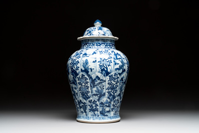 A Chinese blue and white vase and cover with landscapes and flowers, Kangxi