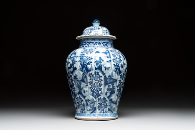 A Chinese blue and white vase and cover with landscapes and flowers, Kangxi