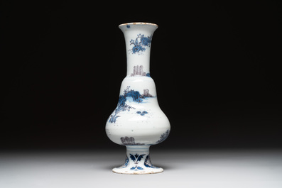 A Dutch Delft blue, white and manganese pear-shaped chinoiserie vase, late 17th C.