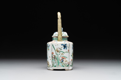 A Chinese famille verte 'flower and butterfly' teapot with an upright handle, Kangxi
