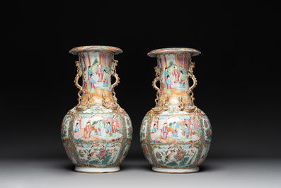 A pair of Chinese Canton famille rose vases with narrative design, 19th C.