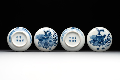 A pair of Chinese blue and white and a pair of blue, white and copper-red seal paste boxes, Kangxi and Qianlong mark, 19th C.