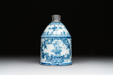 A Dutch Delft blue and white tea caddy with a pipe smoker, 18th C.