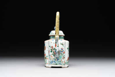 A Chinese famille verte 'flower and butterfly' teapot with an upright handle, Kangxi