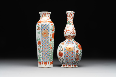 Two polychrome Dutch Delft petit feu vases with floral design, early 18th C.