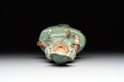 A Chinese Longquan celadon Guanyin, Ming or later