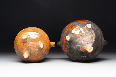 A collection of 10 parcel-glazed pottery so-called &lsquo;grapen&rsquo;, tripod cooking pots, 14th/17th C.