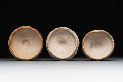 A 18-piece study collection of stoneware mugs, drinking vessels, pottery and stoneware oil lamps, mainly Germany, 15th C. and later