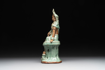 A Chinese Longquan celadon Guanyin, Ming or later