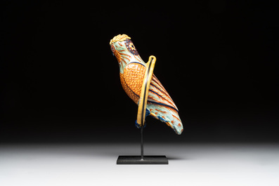 A polychrome Dutch Delft parrot on a later metal stand, 18/19th C.