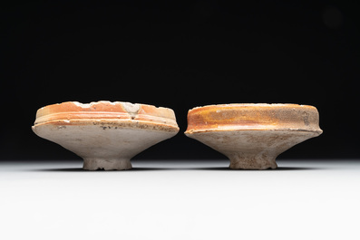 A 18-piece study collection of stoneware mugs, drinking vessels, pottery and stoneware oil lamps, mainly Germany, 15th C. and later