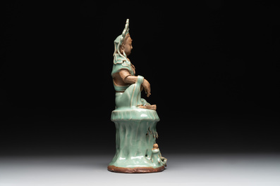 A Chinese Longquan celadon Guanyin, Ming or later