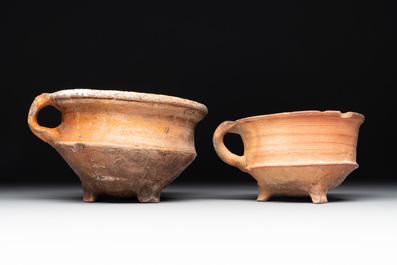 A collection of 10 parcel-glazed pottery so-called &lsquo;grapen&rsquo;, tripod cooking pots, 14th/17th C.
