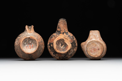 A 18-piece study collection of stoneware mugs, drinking vessels, pottery and stoneware oil lamps, mainly Germany, 15th C. and later
