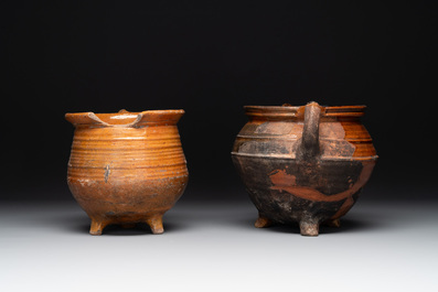 A collection of 10 parcel-glazed pottery so-called &lsquo;grapen&rsquo;, tripod cooking pots, 14th/17th C.