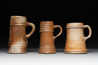 A 18-piece study collection of stoneware mugs, drinking vessels, pottery and stoneware oil lamps, mainly Germany, 15th C. and later