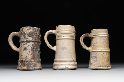 A 18-piece study collection of stoneware mugs, drinking vessels, pottery and stoneware oil lamps, mainly Germany, 15th C. and later