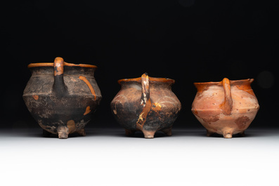 A collection of 10 parcel-glazed pottery so-called &lsquo;grapen&rsquo;, tripod cooking pots, 14th/17th C.