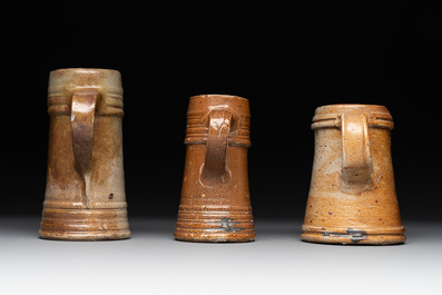 A 18-piece study collection of stoneware mugs, drinking vessels, pottery and stoneware oil lamps, mainly Germany, 15th C. and later